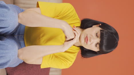Vertical-video-of-Emotional-young-woman.